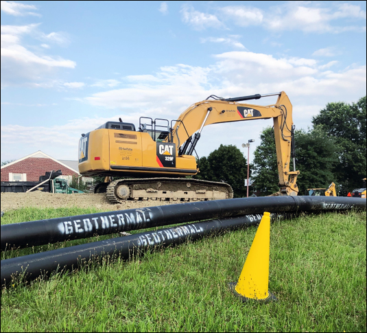 Geothermal energy piping installed during construction at a district thermal energy site.
