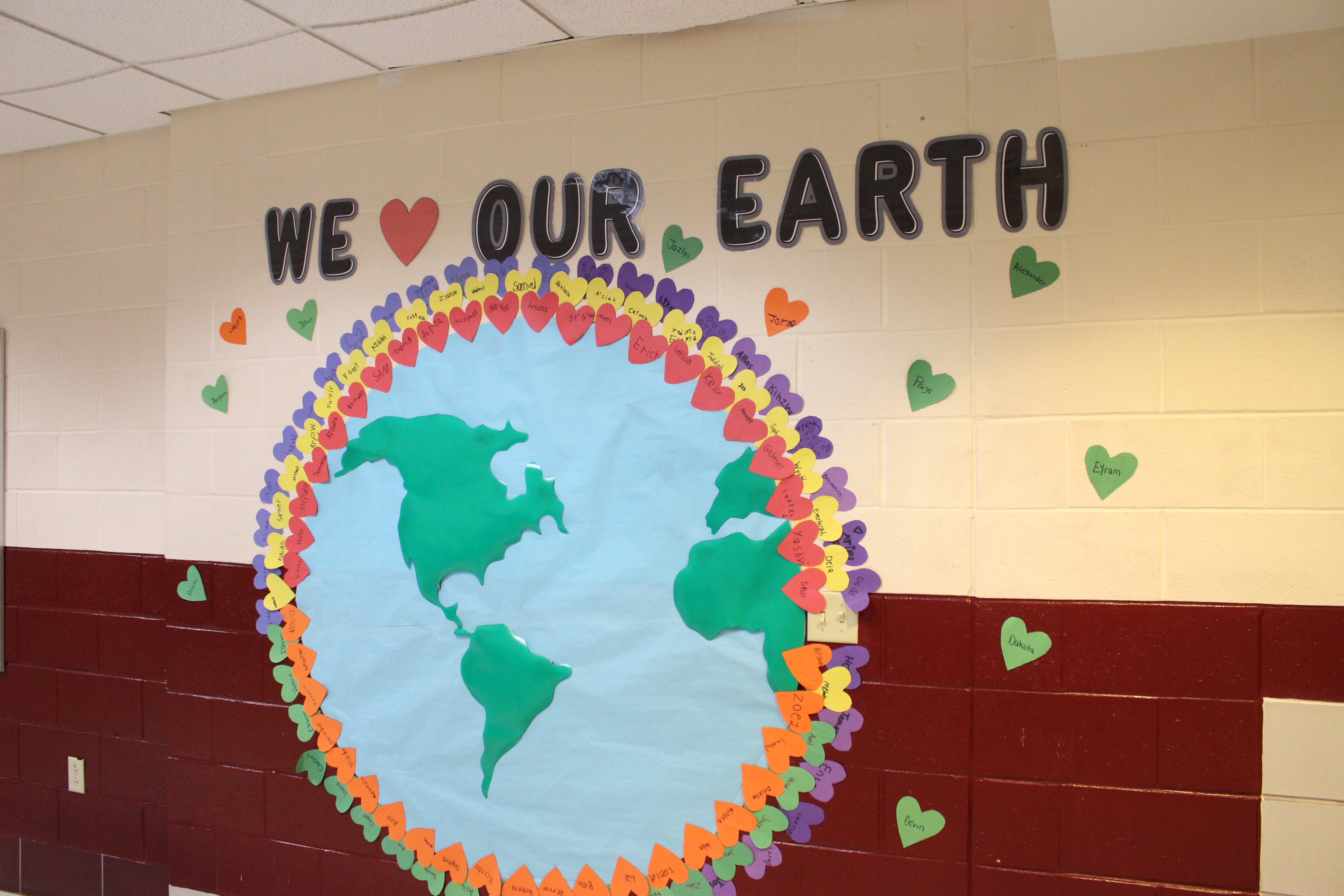 A student-made wall art piece of Earth.