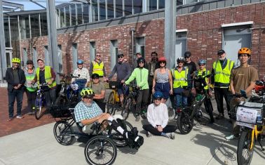 A group of people on e-bikes.