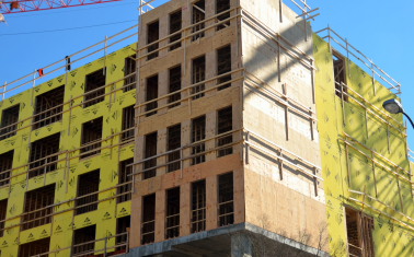 Photo of condo building under construction courtesy of Paul Brennan.