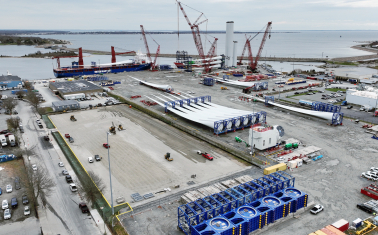 Aerial view of the New Bedford Marine Commerce Terminal serving as a staging and preparation area for construction of the Vineyard Wind 1 offshore wind project.