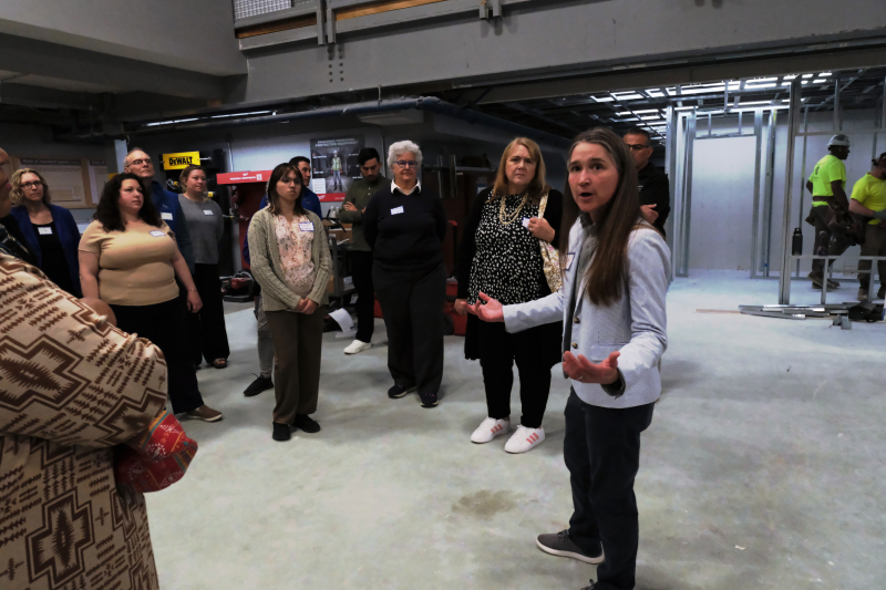 Ziven Drake takes Community of Practice members through a tour of the North Atlantic States Carpenters Training Center in Millbury, MA.