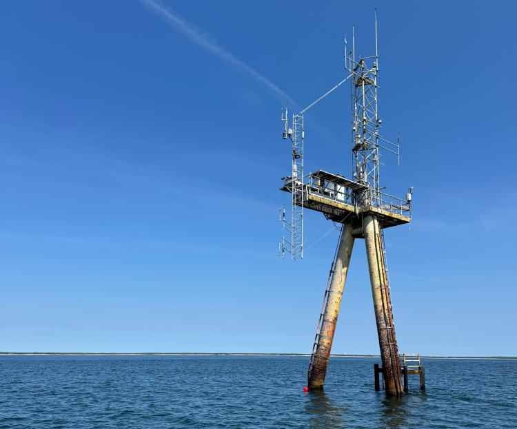 WHOI's Air Sea Interaction Tower, a tall structure in the ocean for offshore research.