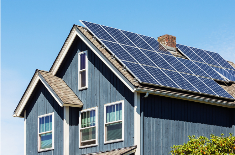 Blue house with a roof solar array