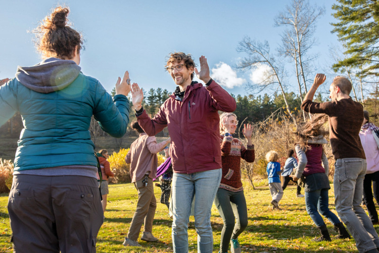 People playing a theater game outdoors
