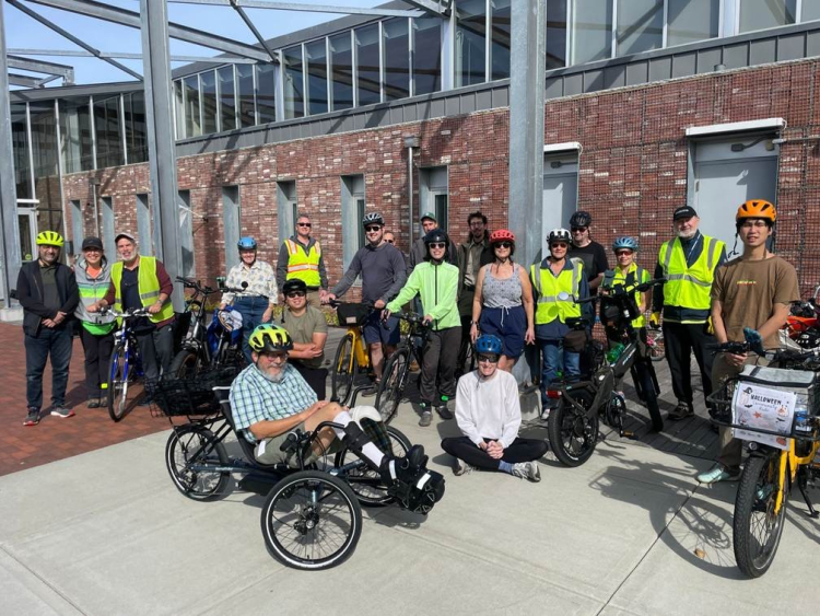 A group of people on e-bikes.