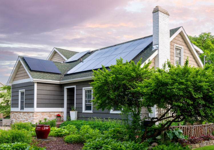 Single family home with solar panels in suburban setting