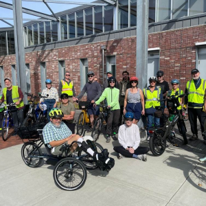 A group of people on e-bikes.