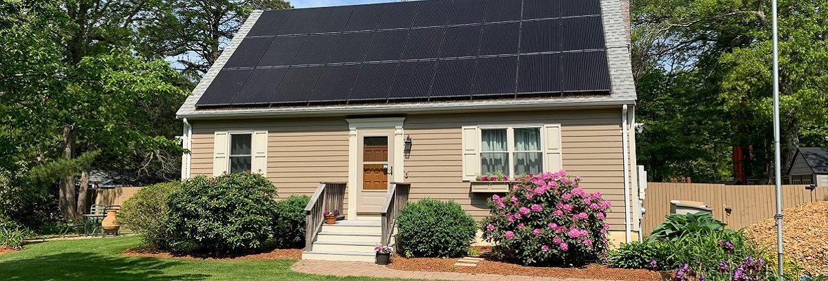 Home with solar panels in Mashpee, MA
